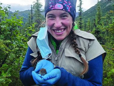 Sarah Swanson with a small mammal