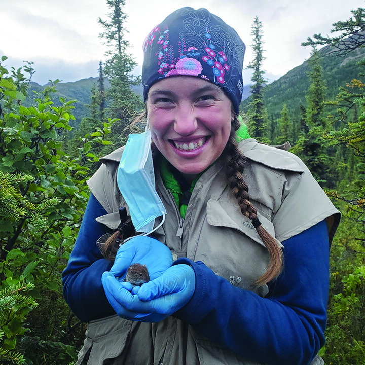 Sarah Swanson with a small mammal